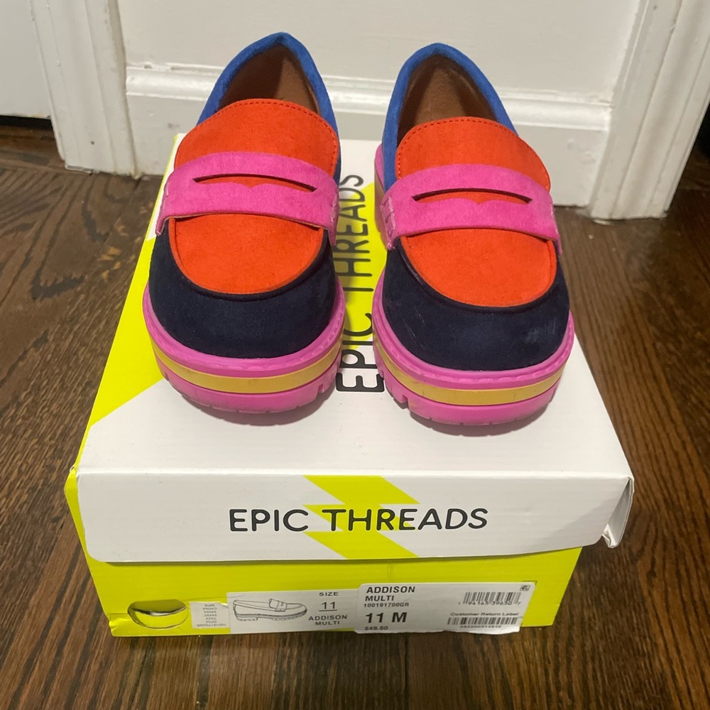 Girl bright multicolor loafer worn once and then her foot grew immediately.
